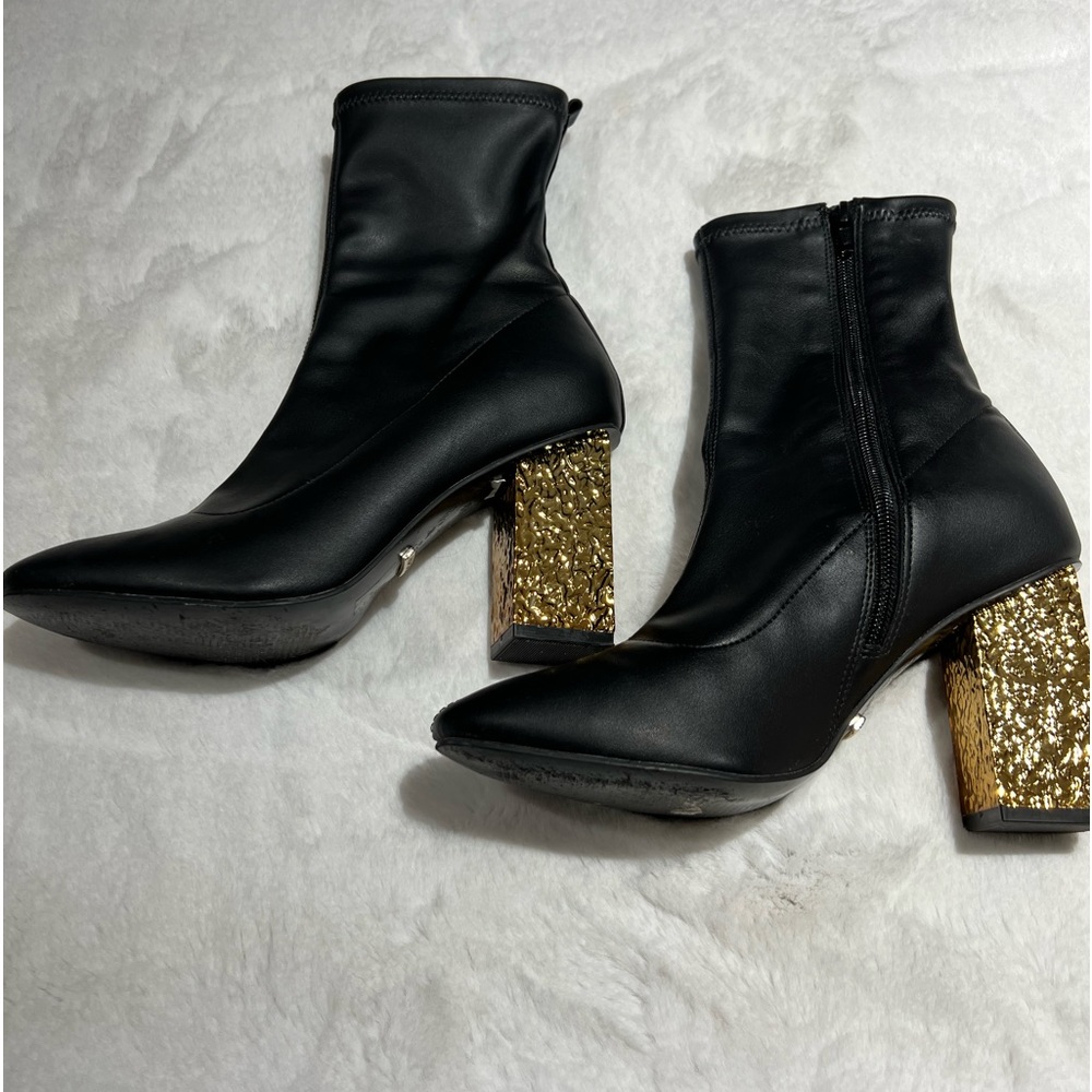 Super cute black stylish boots with gold heels